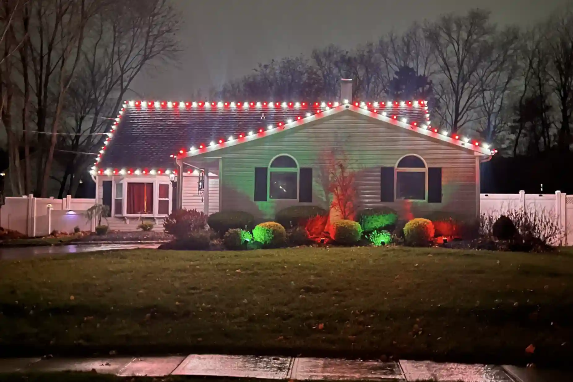 Professional roofline holiday lights installation in Long Island by Dr. Drizzle