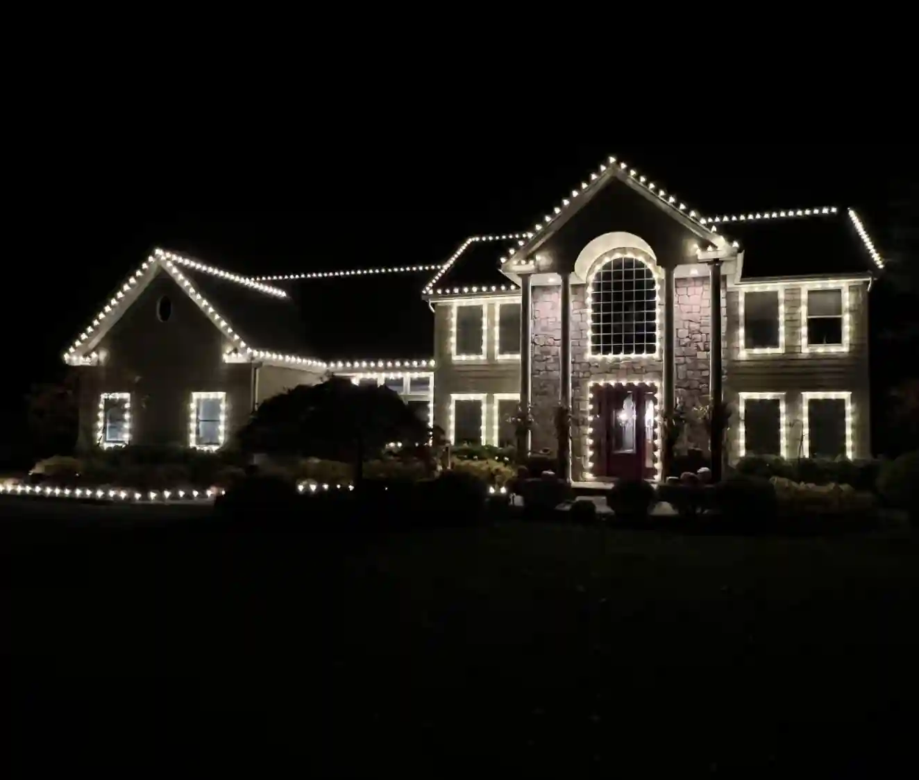 Dr. Drizzle Holiday Lights team providing professional holiday lighting services in Long Island
